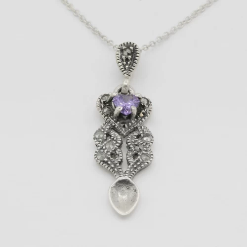 A product image for the product Sterling Silver Gemstone Lovespoon Necklace (Amethyst).