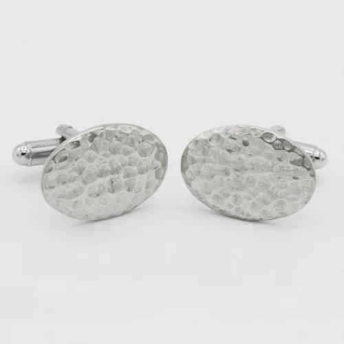 A product image for the product Tin Beaten Oval Cufflinks.