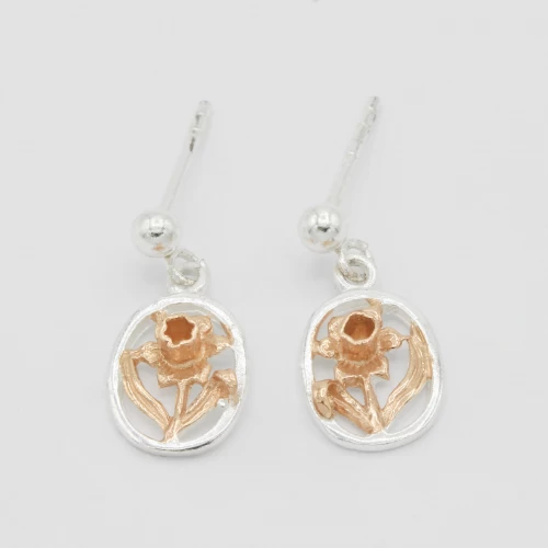 A product image for the product Sterling Silver and Rose Gold Oval Daffodil Earrings.