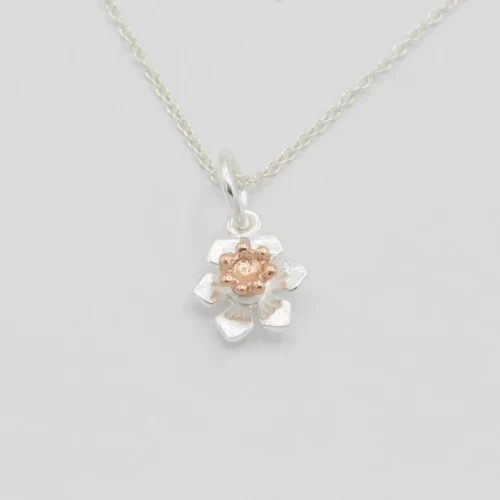 A product image for the product Sterling Silver & Rose Gold Daffodil Necklace (Small).