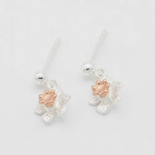 A product image for the product Sterling Silver and Rose Gold Daffodil Drop Earrings.