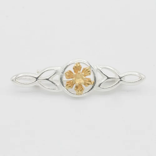 A product image for the product Sterling Silver and Yellow Gold Celtic Daffodil Brooch.