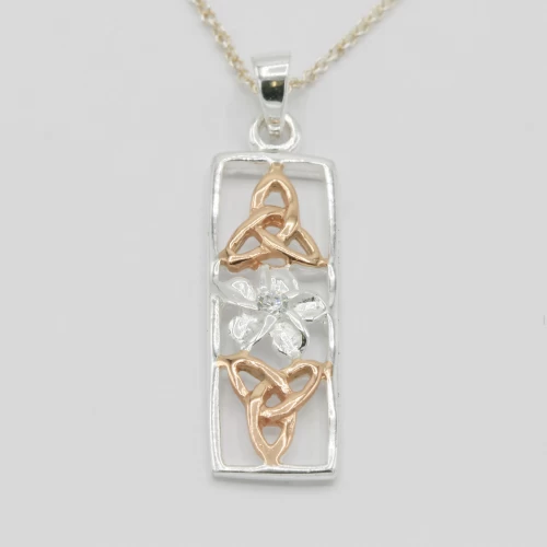 A product image for the product Sterling Silver & Rose Gold Celtic and Daffodil Necklace.