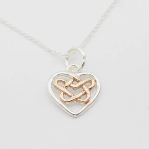 A product image for the product Sterling Silver & Rose Gold Celtic Heart Necklace.