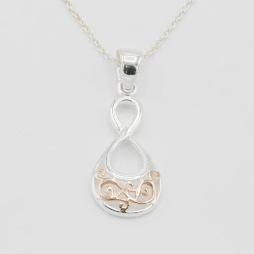 A product image for the product Sterling Silver & Rose Gold Celtic Twist Necklace.