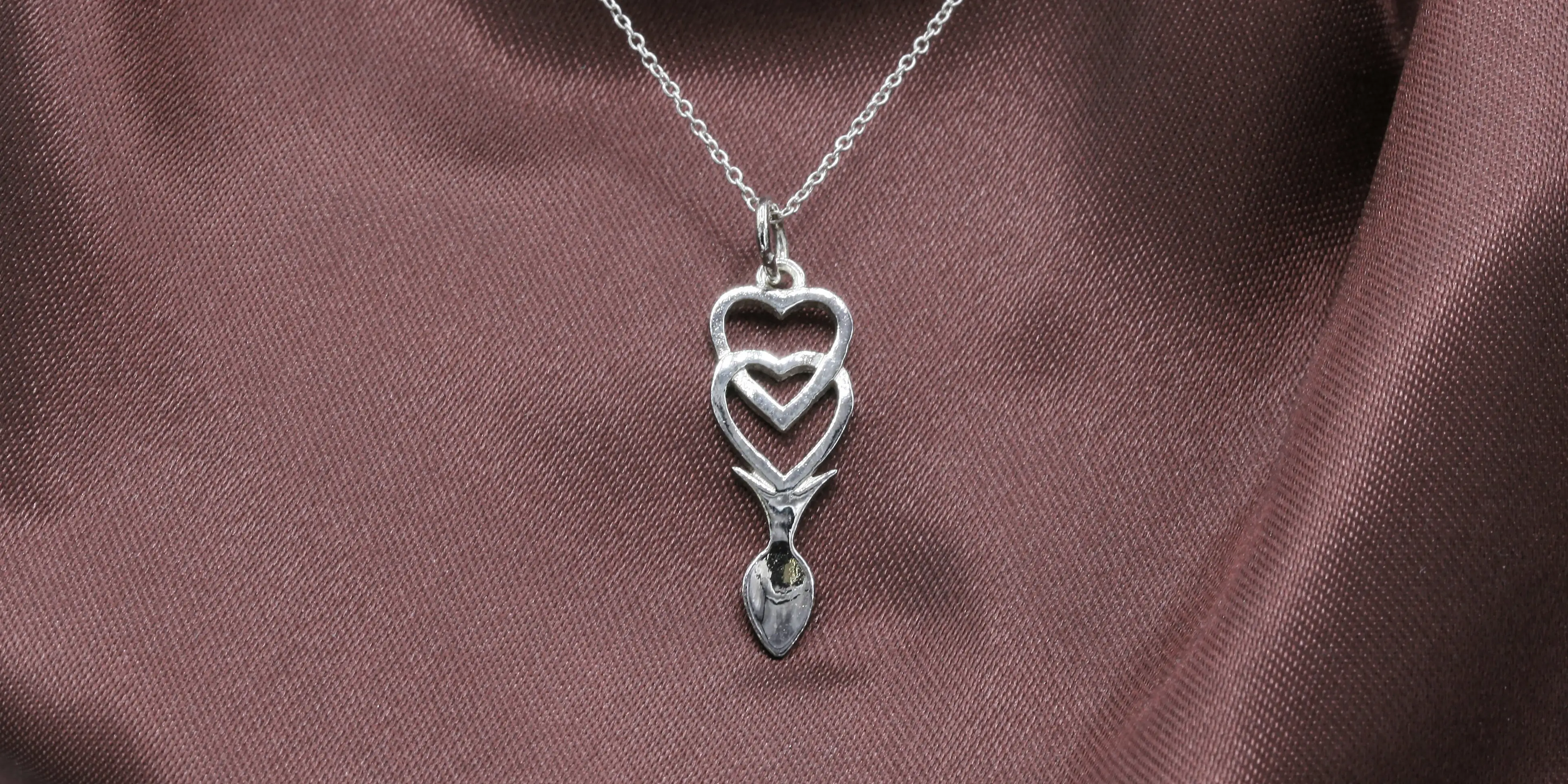 Main category image for Necklaces depicting a lovespoon necklace.